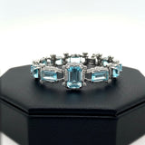Modern Diamond and Blue Topaz 18K White Gold Bracelet