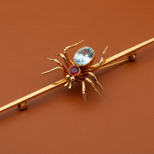 English Blue Topaz,Garnet Spider and 9K Yellow Gold Brooch
