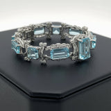 Modern Diamond and Blue Topaz 18K White Gold Bracelet