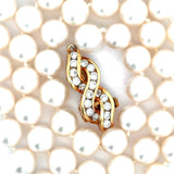Modern 1990's Japanese Akoya Cultured Pearl and Diamond 18kt Yellow Gold Necklace