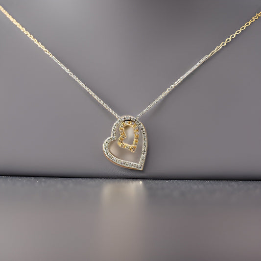 E.H. Collection .29 cttw Diamond White/Yellow Gold Heart Pendant with Chain