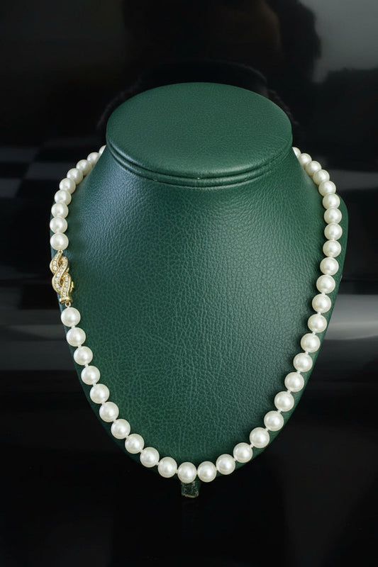 Modern 1990's  Japanese Akoya 7.75mm Cultured Pearl and Diamond 18kt Yellow Gold Necklace