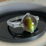 Cat's Eyes Tourmaline, Diamond and Platinum Three-Stone Ring