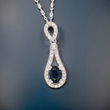 1.18 ct Sapphire and .36 cttw Diamond Halo Pendant 00262