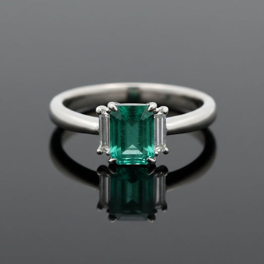 Modern Emerald and Diamond Platinum Ring