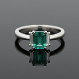 Modern Emerald and Diamond Platinum Ring