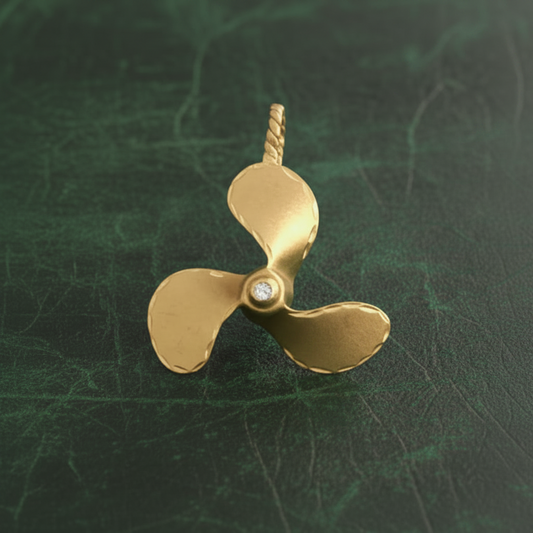 Modern 1960's Diamond and 14k Yellow Gold Nautical Prop Pendant